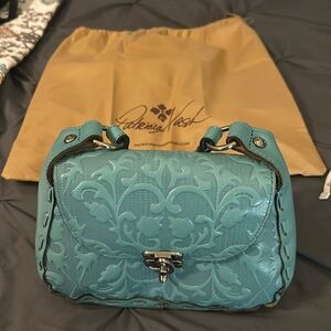 Brand new leather turquoise hand bag